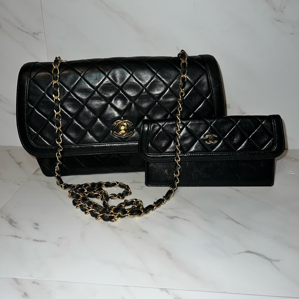 Chanel flap in black with wallet . Gold hardware.